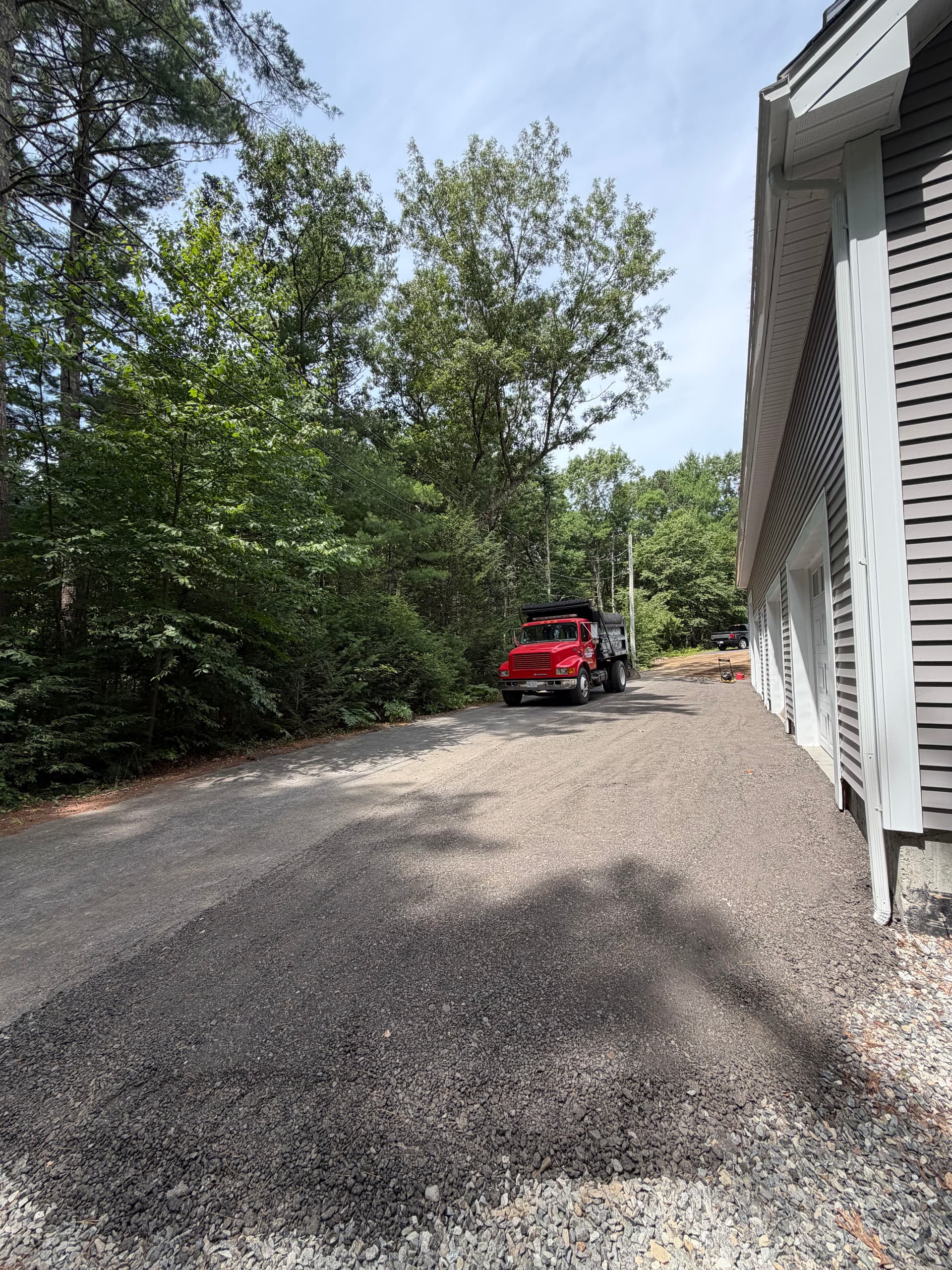Gallery photos for Garage Apron Regrind and Stone Wall Fixes a Drainage Problem: Image #2