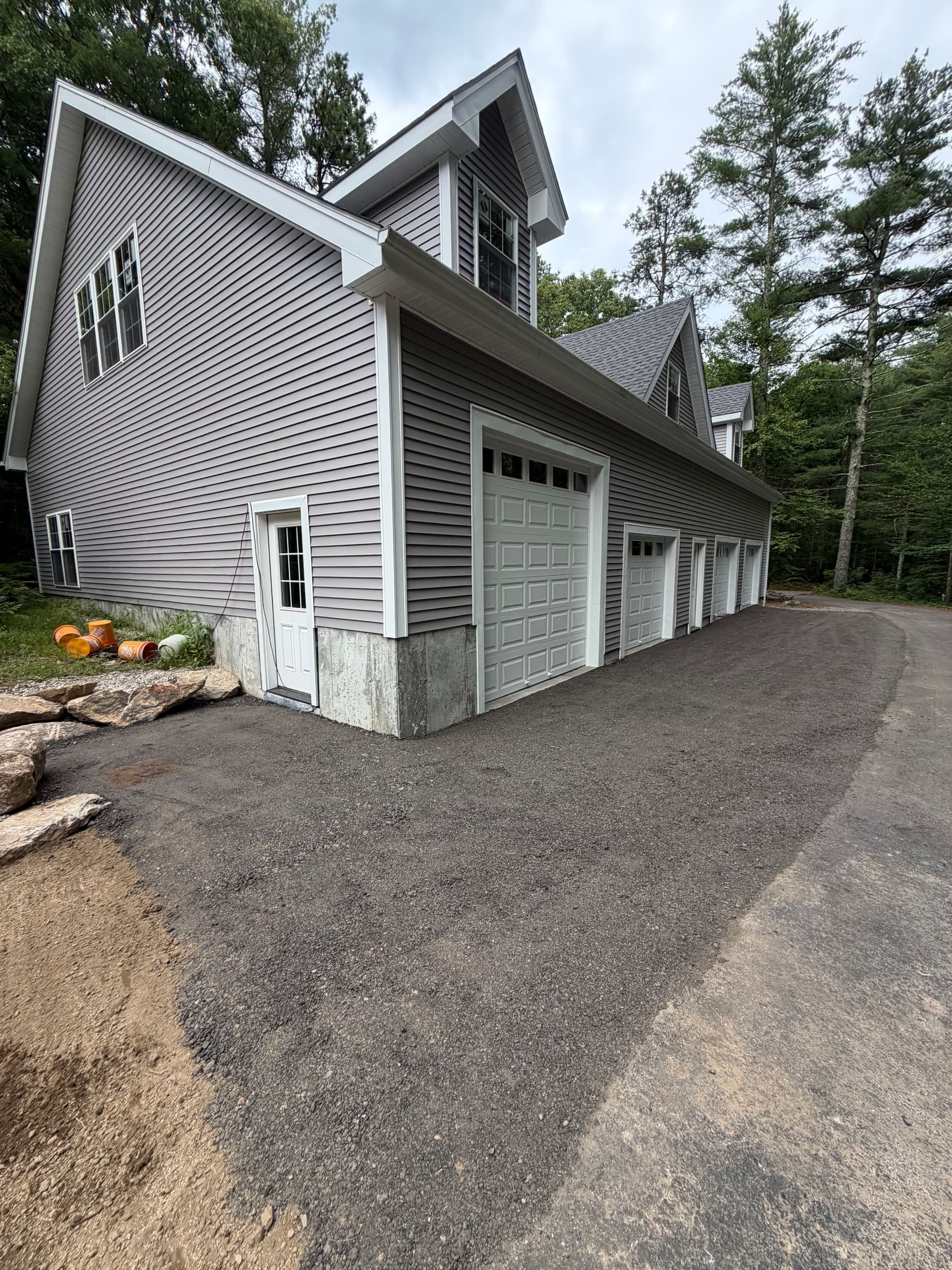 Gallery photos for Garage Apron Regrind and Stone Wall Fixes a Drainage Problem: Image #3