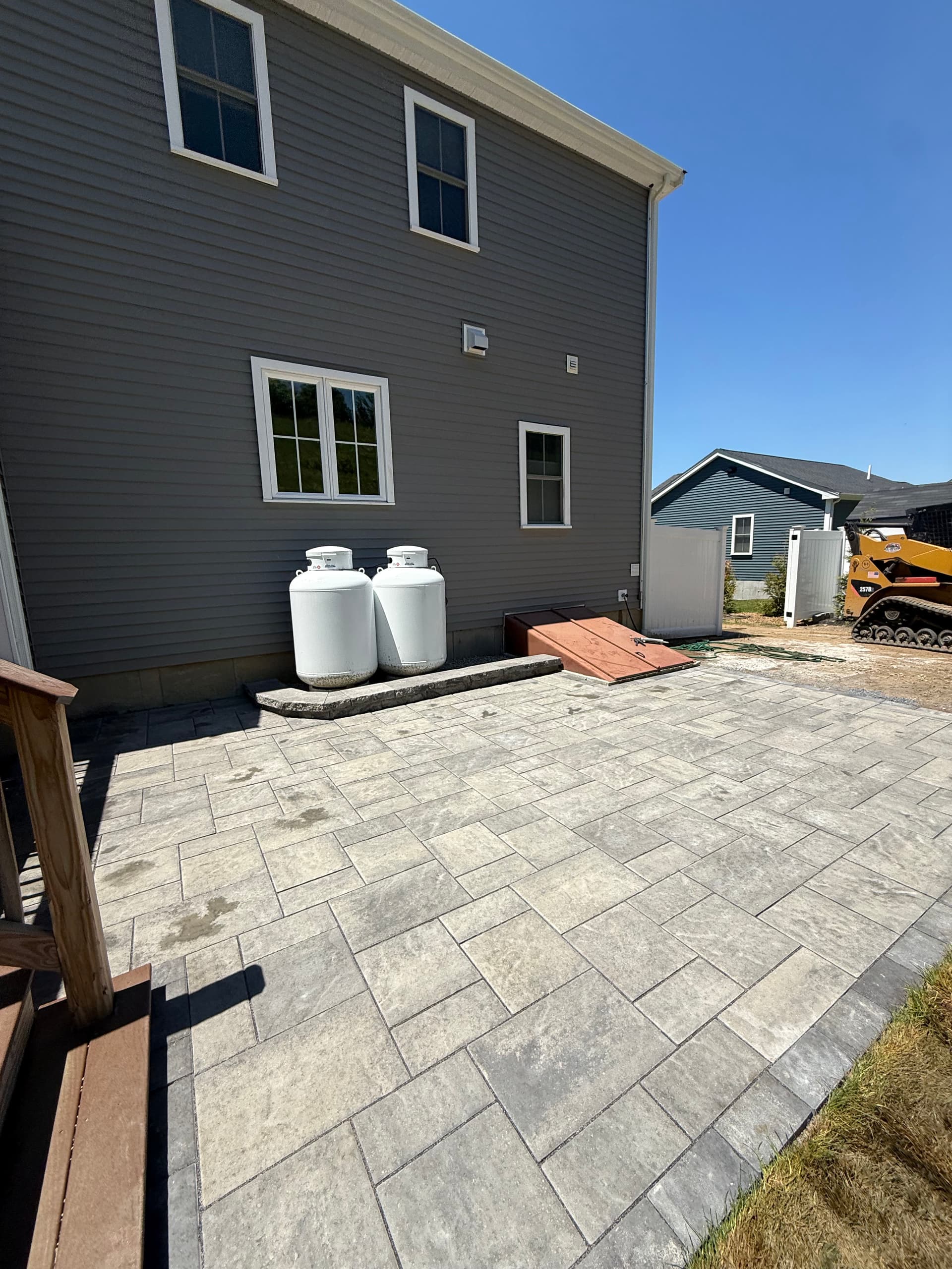 Gallery photos for Bare Dirt Backyard Gets a Techo-Bloc Blu 60 Paver Patio: Image #2