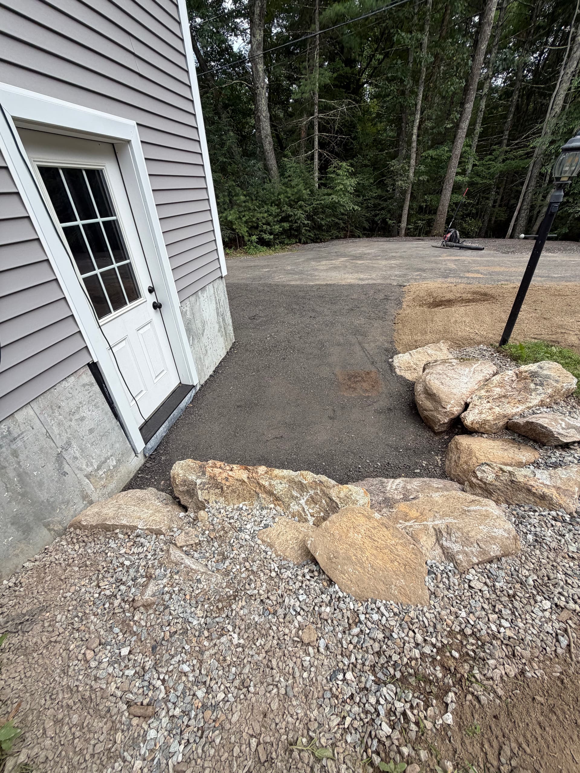 Gallery photos for Garage Apron Regrind and Stone Wall Fixes a Drainage Problem: Image #4