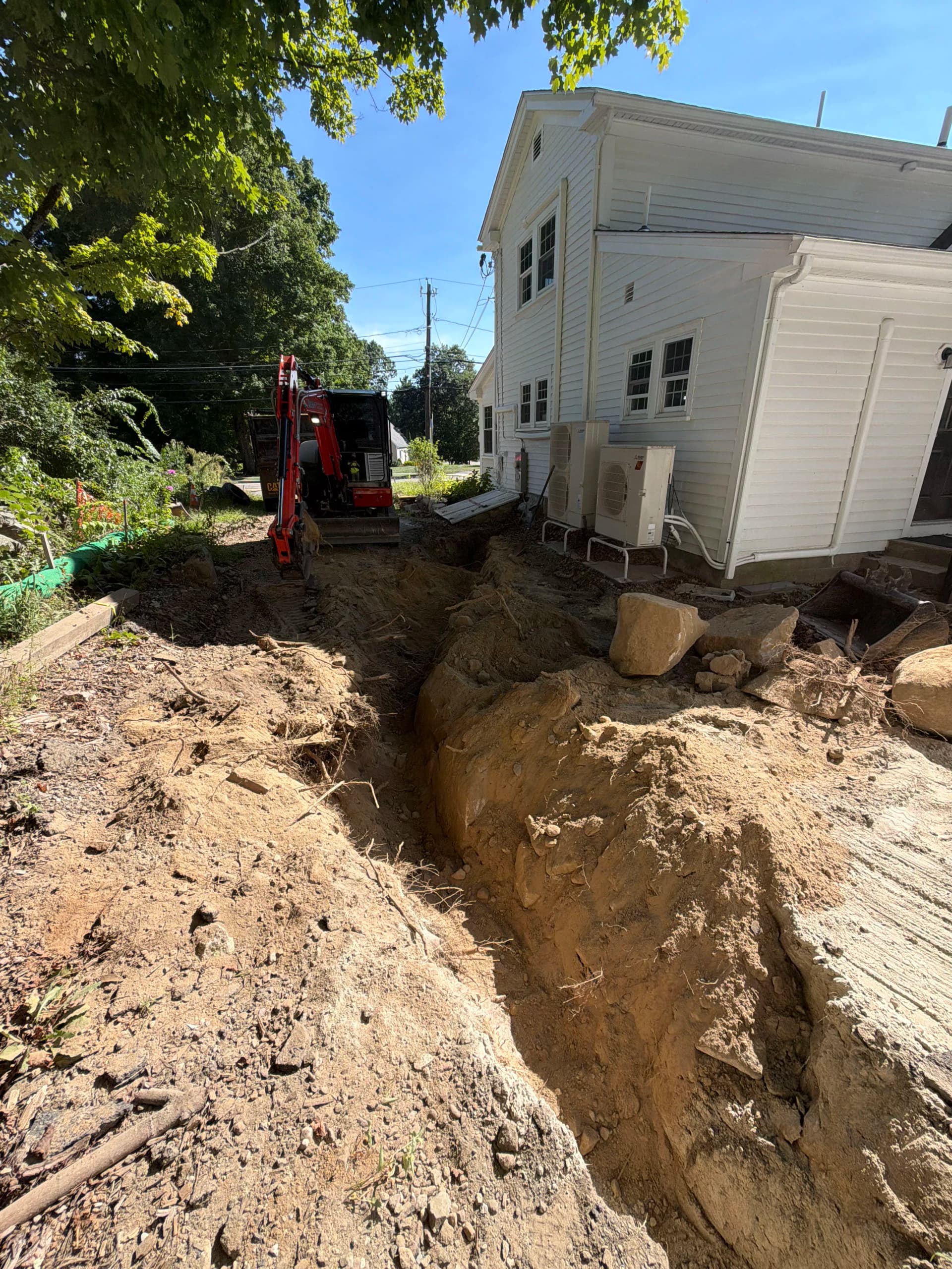Electrical Trench Dug Through Rocky Ground in Medway MA image