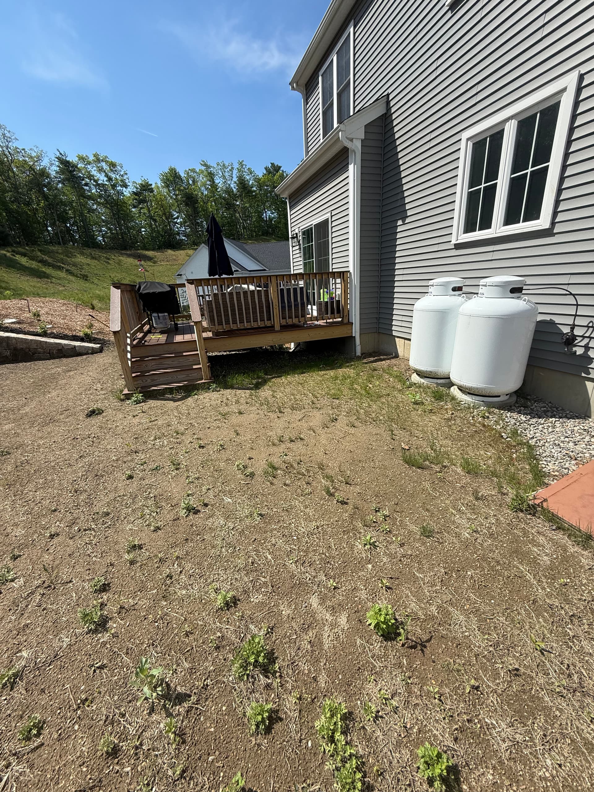 Bare Dirt Backyard Gets a Techo-Bloc Blu 60 Paver Patio image