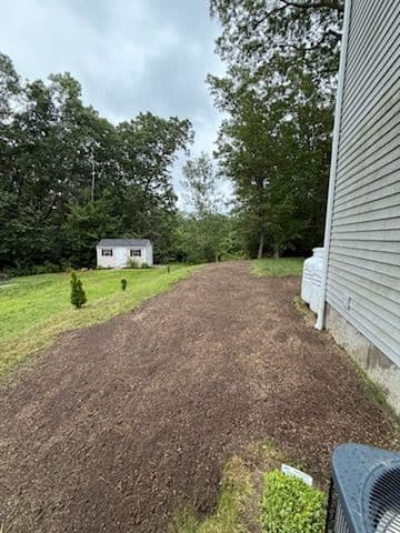 Gallery photos for Lush Lawn Transformation with Expert Loam Spreading: Image #2
