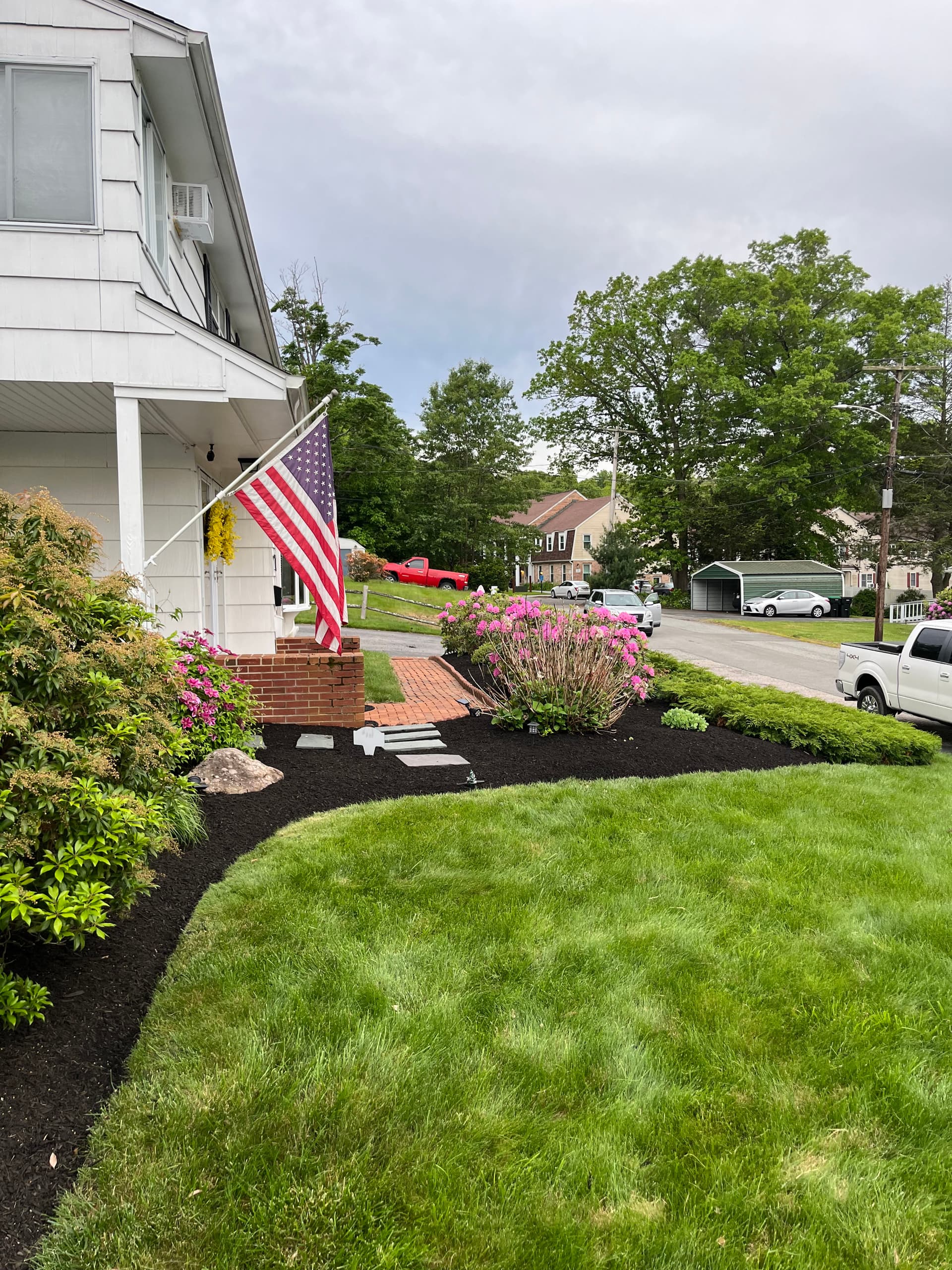 Enhancing Beauty and Harmony Through Mulch and Stone image